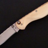 F26 - Mammoth Ivory Toggle Release Video Knife $475.00 