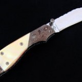 F22 - Left Handed Scale Release Folder DVD knife $1150.00 